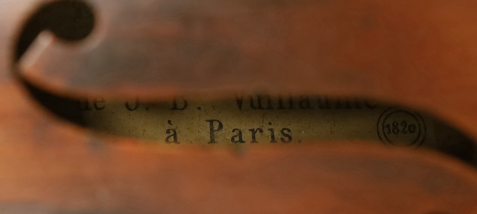 A cased French double backed violin, interior label reads ‘Copie de J.B. Vuillaume à Paris.’ Back measures 36cm excluding button
